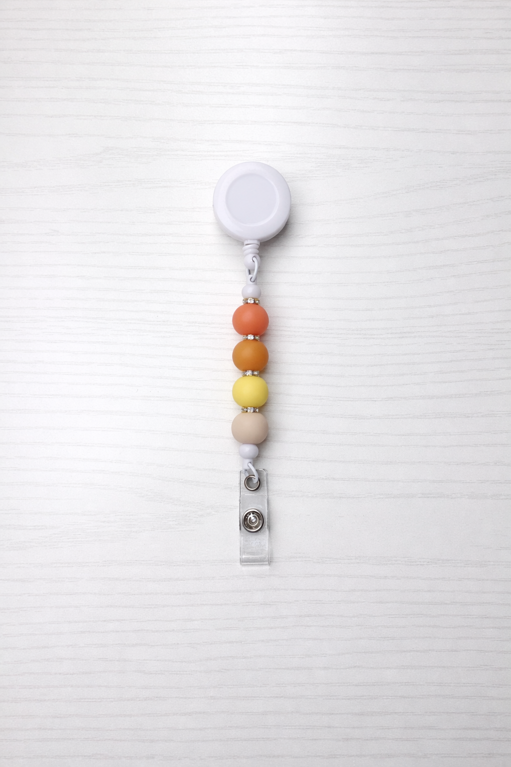 Orange & Yellow Badge Beaded Reel